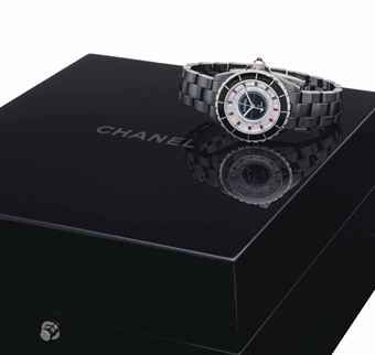 Chanel. A Fine Limited Edition 18k White Gold and Ceramic Automatic Wristwatch Set with Diamonds and Rubies