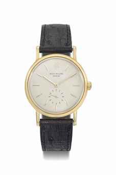 PATEK PHILIPPE. AN ATTRACTIVE 18K GOLD AUTOMATIC WRISTWATCH