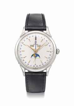 Omega. A large, elegant and rare stainless steel wristwatch with triple calendar and moon phases