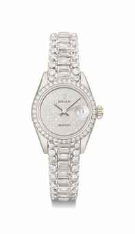 Rolex. A fine and rare lady's 18K white gold and diamond-set automatic wristwatch with date and diamond-set bracelet
