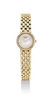 PATEK PHILIPPE. A LADY'S FINE 18K GOLD AND DIAMOND-SET BRACELET WATCH WITH MOTHER-OF-PEARL DIAL