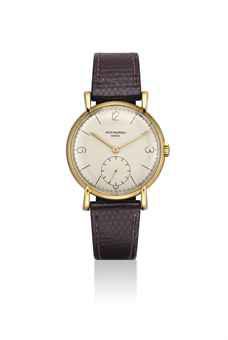 PATEK PHILIPPE. A FINE 18K GOLD WRISTWATCH