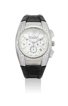 BULGARI. AN 18K WHITE GOLD AND DIAMOND-SET TONNEAU-SHAPED AUTOMATIC CHRONOGRAPH WRISTWATCH WITH DATE