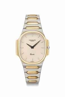 Patek Philippe. A fine stainless steel and 18K gold quartz bracelet watch