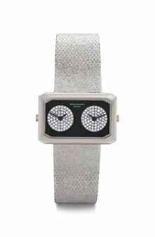 Patek Philippe. An Unusual and Attractive 18k White Gold, Onyx, and Diamond-set Dual Time Wristwatch