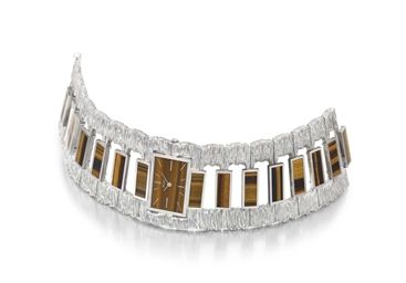 Piaget. A highly unusual, very rare and attractive 18K white gold and tiger’s eye bracelet watch