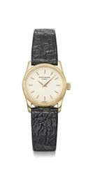 Patek Philippe. A lady's fine and unusual 18K gold wristwatch with hobnail bezel