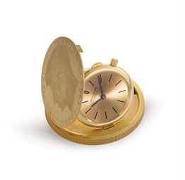 Patek Philippe. A Fine and Important 18k Gold Coin Watch, Commemorating President John F. Kennedy