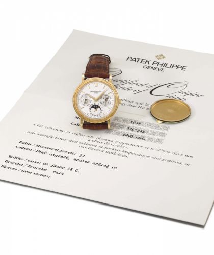 Patek Philippe. A fine 18K gold automatic perpetual calendar wristwatch with moon phases, original certificate and second case back