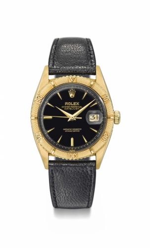 Rolex. A very fine, rare and attractive 18K gold automatic wristwatch with sweep centre seconds, date and black gloss dial