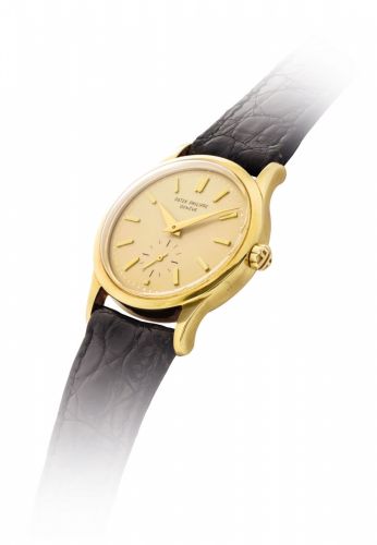 PATEK PHILIPPE. A FINE AND RARE 18K GOLD AUTOMATIC WRISTWATCH WITH GILT DIAL