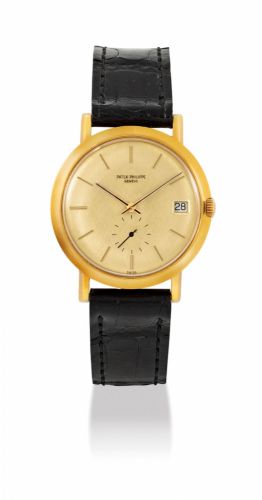 PATEK PHILIPPE. AN 18K GOLD AUTOMATIC WRISTWATCH WITH DATE AND GILT DIAL
