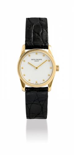 PATEK PHILIPPE. A LADY/bb’/bbS ELEGANT 18K GOLD WRISTWATCH/b