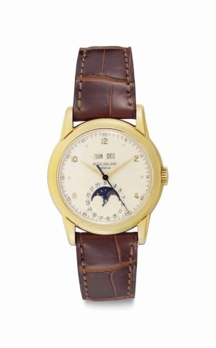 Patek Philippe. A Very Fine and Extremely Rare 18k Gold Perpetual Calendar Wristwatch with Moon Phases and Center Seconds