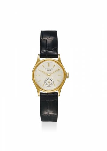 PATEK PHILIPPE. A FINE, RARE AND ATTRACTIVE 18K YELLOW GOLD CALATRAVA AUTOMATIC WRISTWATCH WITH EXTRACT FROM THE ARCHIVES
