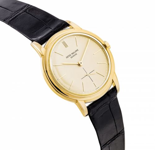 PATEK PHILIPPE. A FINE 18K GOLD AUTOMATIC WRISTWATCH