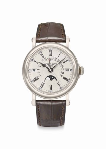 Patek Philippe. A Fine 18k White Gold Automatic Perpetual Calendar Wristwatch with Leap Year Indication, Retrograde Date, Center Seconds and Moon Phases