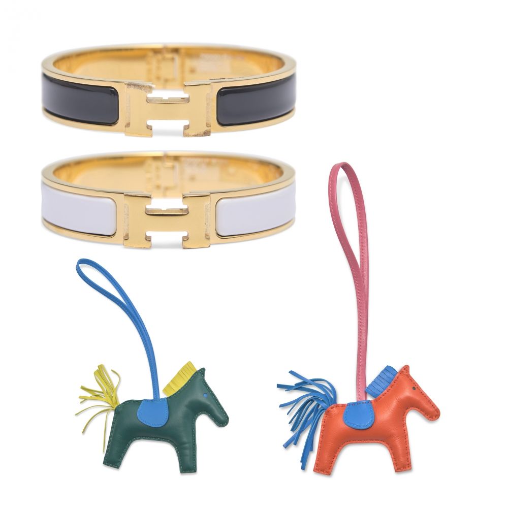A SET OF FOUR: A MALACHITE SWIFT LEATHER RODEO MM & AN ORANGE POPPY SWIFT LEATHER RODEO PM, A WHITE & A BLACK ENAMEL CLIC H PM BRACELETS WITH GOLD HARDWARE HERMÈS, 2010S
