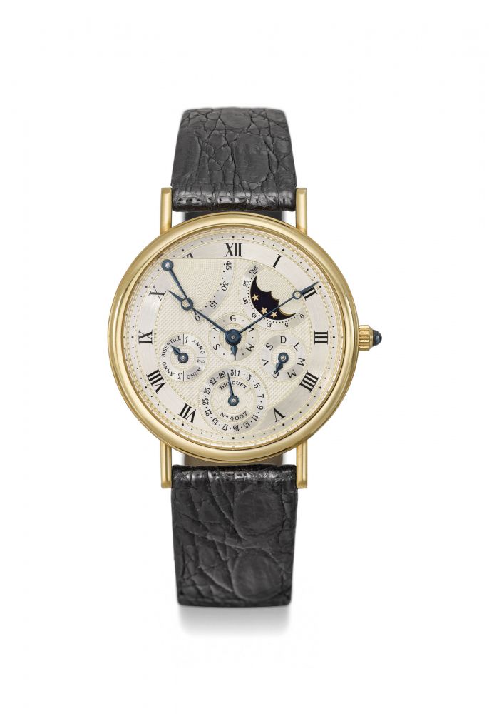 Breguet. A fine 18K gold automatic perpetual calendar wristwatch with power reserve, moon phases and leap year indication