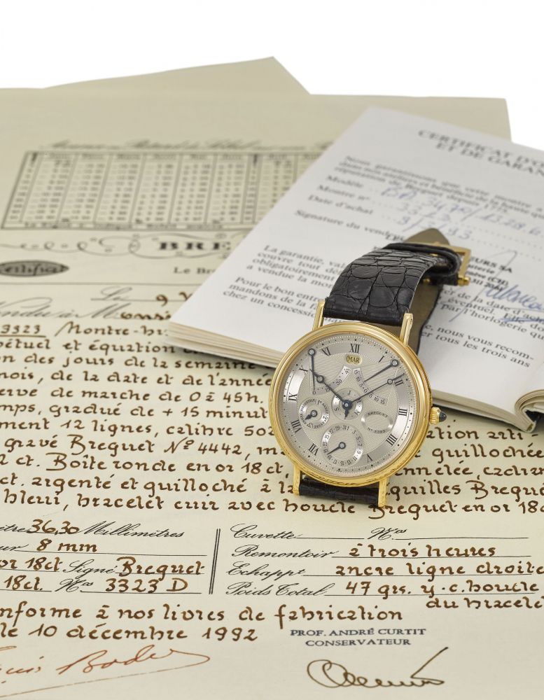Breguet. A very fine 18K gold automatic perpetual calendar wristwatch with equation of time, power reserve, certificate and box