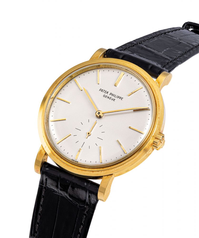 PATEK PHILIPPE. A FINE AND RARE 18K GOLD AUTOMATIC WRISTWATCH