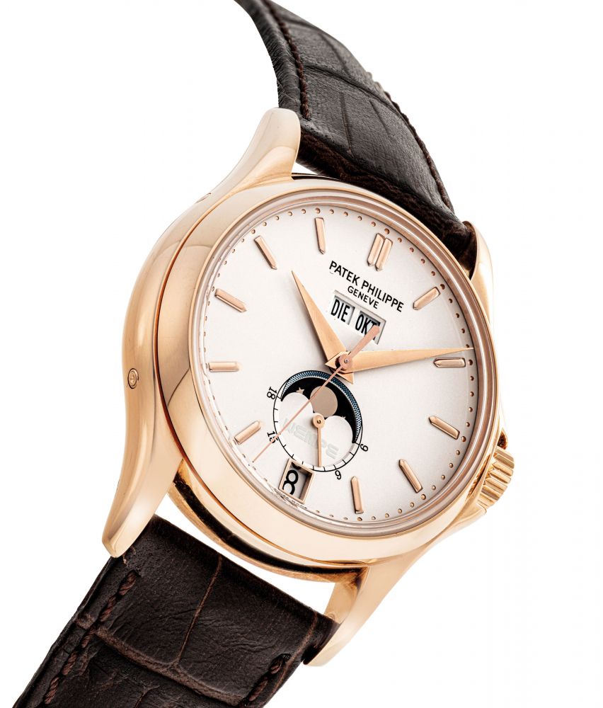 PATEK PHILIPPE. A FINE AND VERY RARE 18K PINK GOLD LIMITED EDITION AUTOMATIC ANNUAL CALENDAR WRISTWATCH WITH SWEEP CENTRE SECONDS, MOON PHASES AND 24 HOURS INDICATION, MADE TO COMMEMORATE THE 125TH ANNIVERSARY OF WEMPE