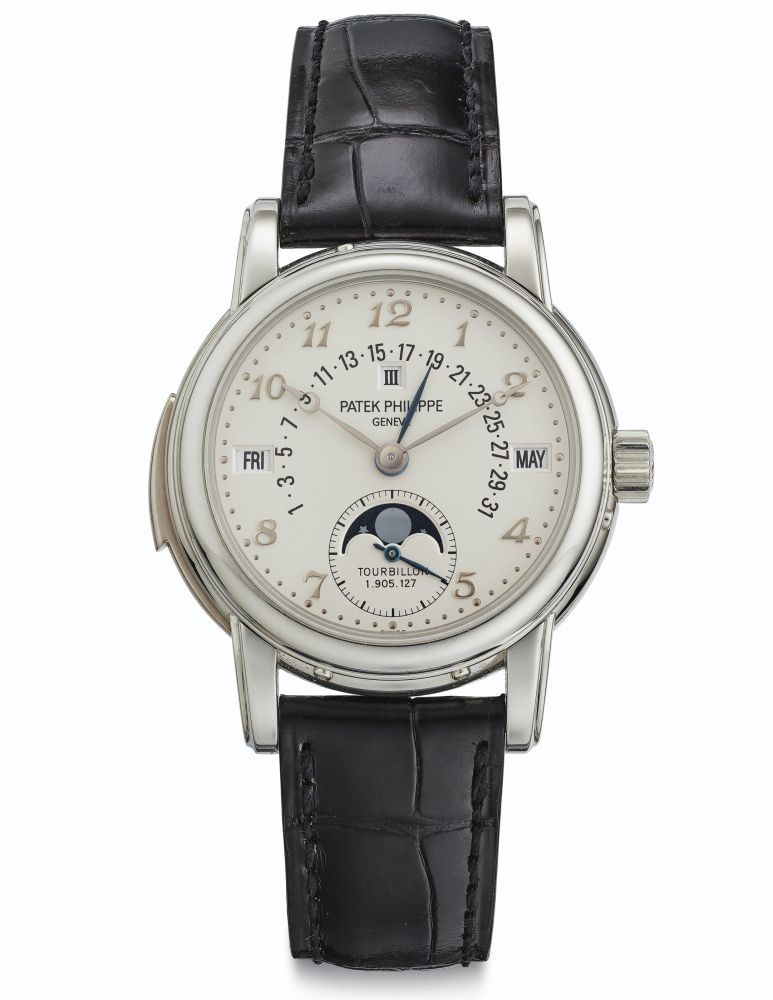 Patek Philippe. An Extremely Fine, Rare and Important Platinum Perpetual Calendar Minute Repeating Tourbillon Wristwatch with Breguet Numerals, Retrograde Date, Moon Phases and Additional Solid Case Back