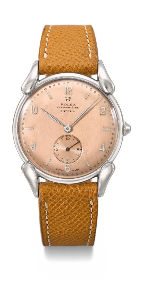 ROLEX. AN ELEGANT AND RARE STAINLESS STEEL WRISTWATCH WITH PINK “SALMON” COLORED DIAL
