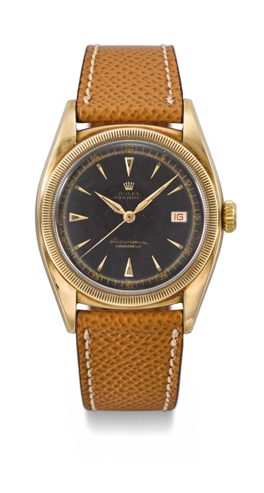 ROLEX. A RARE 14K GOLD AUTOMATIC WRISTWATCH WITH SWEEP CENTRE SECONDS, BLACK DIAL AND DATE
