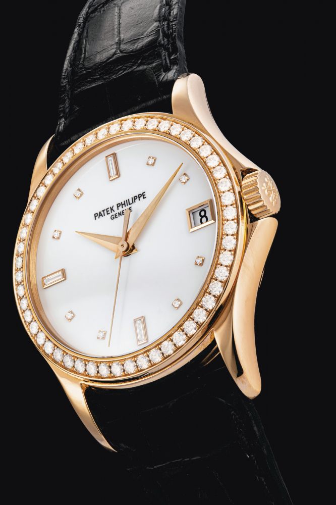 PATEK PHILIPPE. A RARE 18K PINK GOLD AND DIAMOND SET AUTOMATIC WRISTWATCH WITH SWEEP CENTRE SECONDS AND DATE
