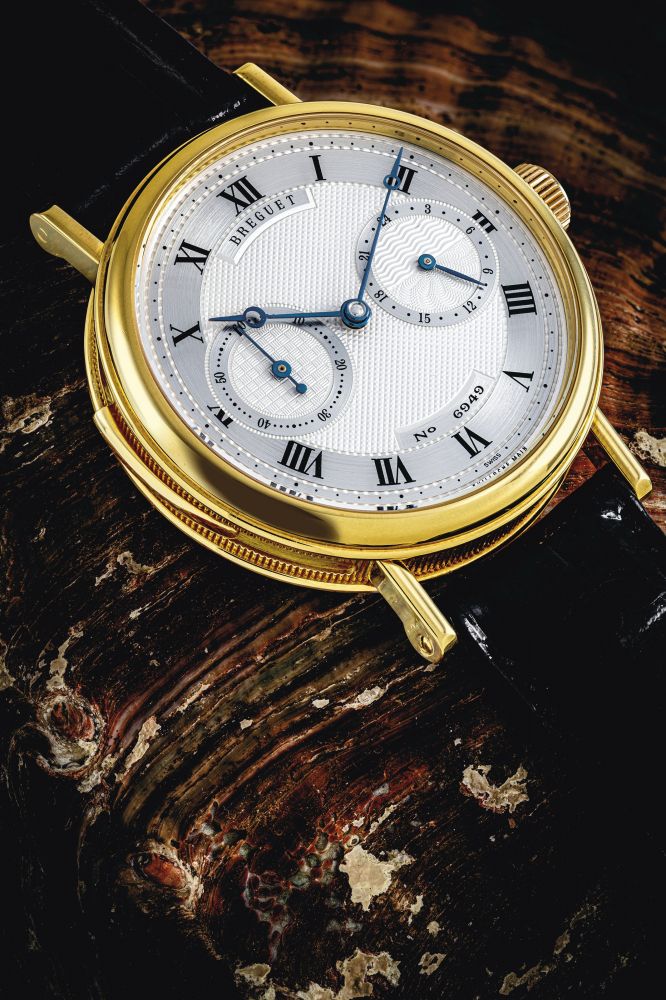 BREGUET. A FINE AND RARE 18K GOLD MINUTE REPEATING WRISTWATCH WITH 24-HOUR INDICATION