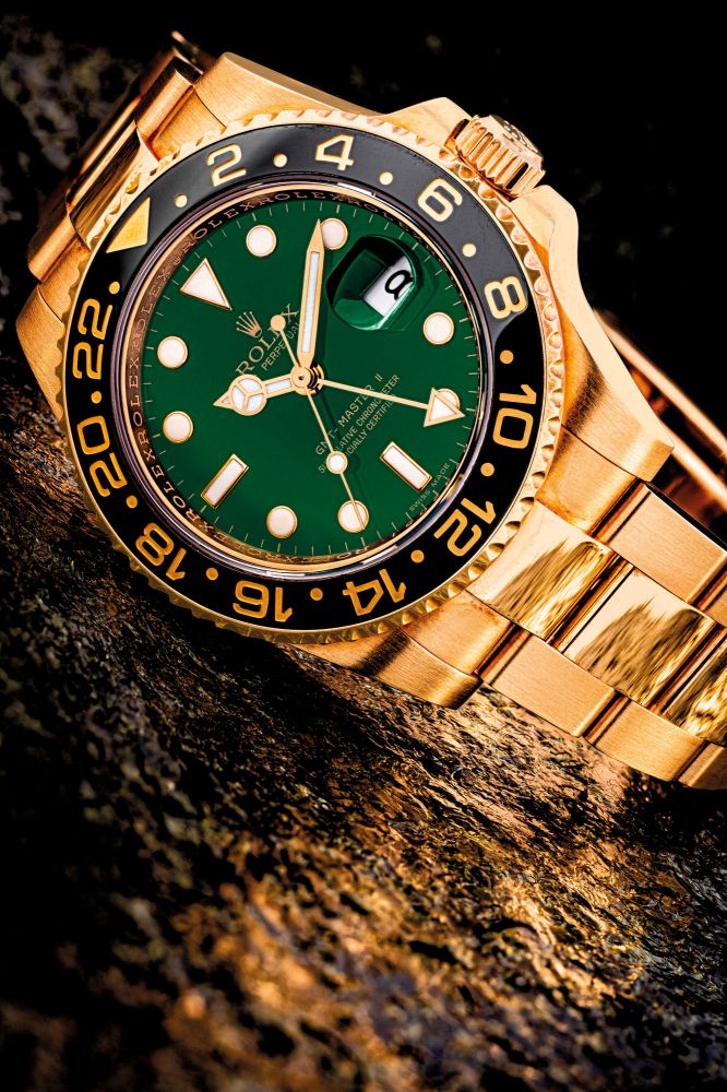 ROLEX. AN 18K GOLD AUTOMATIC DUAL TIME WRISTWATCH WITH SWEEP CENTRE SECONDS, DATE AND BRACELET