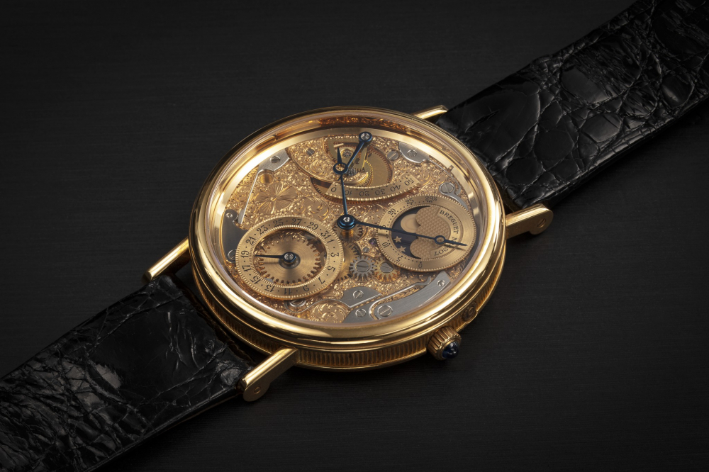 BREGUET, CLASSIQUE REF. 3135BA/00/26, A GOLD OPENWORKED DIAL WRISTWATCH WITH MOONPHASE - CASE