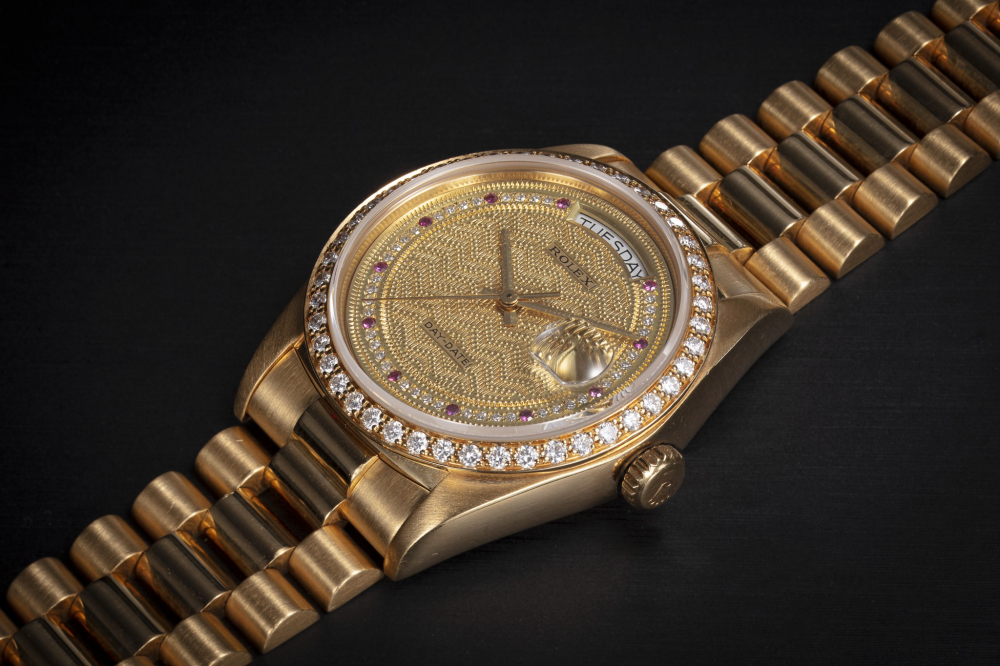 ROLEX, OYSTER PERPETUAL DAY-DATE REF. 18048, A RARE GOLD AND DIAMOND-SET AUTOMATIC WRISTWATCH - CASE