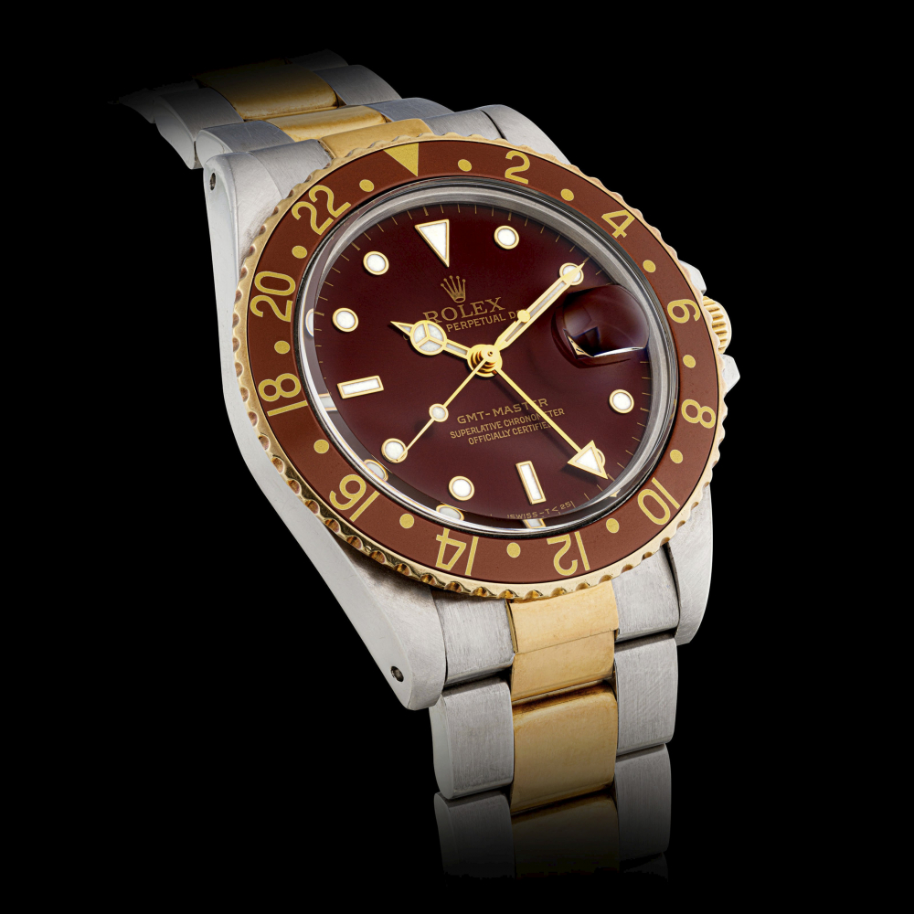 ROLEX. A STAINLESS STEEL AND 18K GOLD AUTOMATIC DUAL TIME WRISTWATCH WITH SWEEP CENTRE SECONDS, DATE AND BRACELET