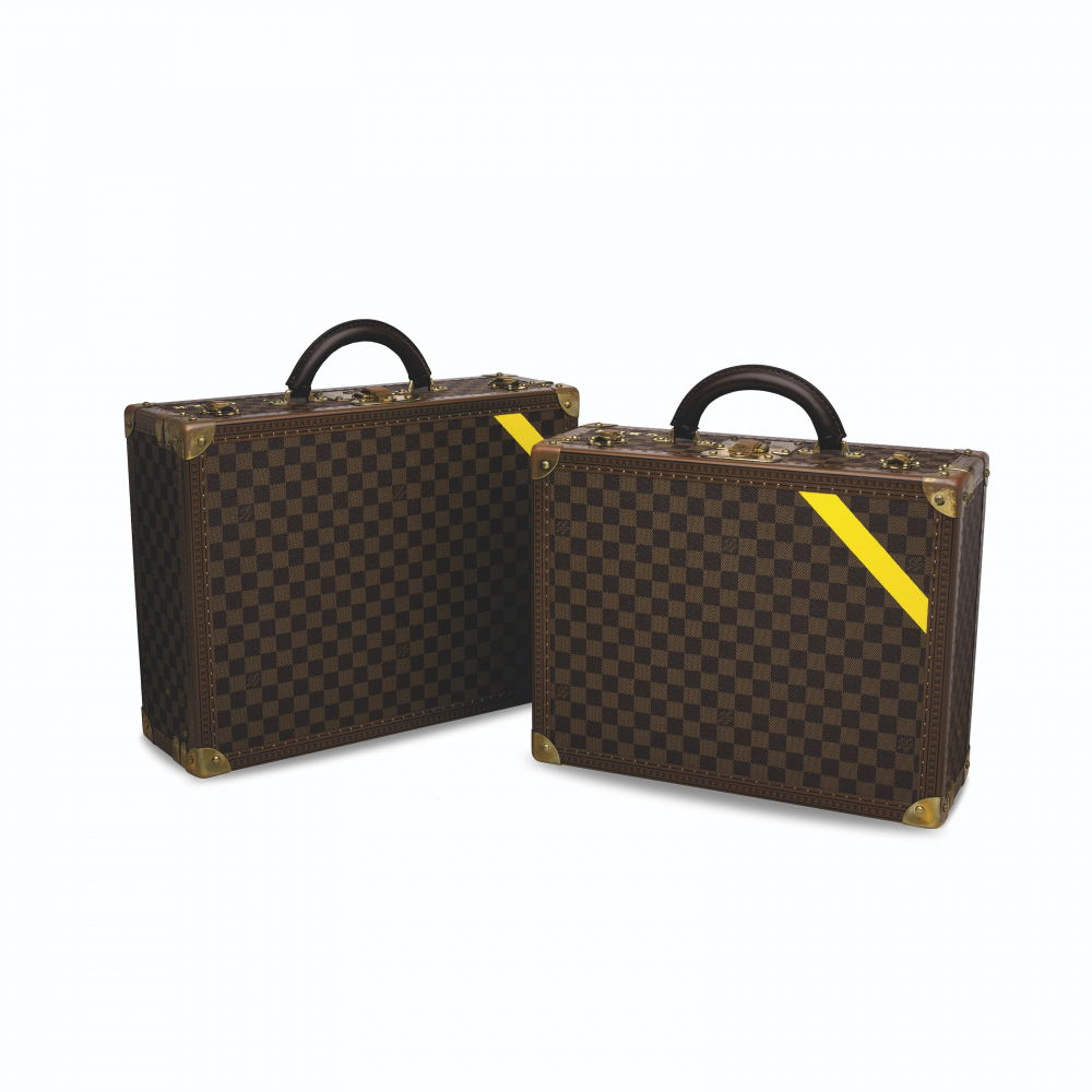 A SET OF TWO: DAMIER CANVAS COTTEVILLE TRUNKS 45 & 40 WITH HAND PAINTED YELLOW STRIP & BRASS HARDWARE