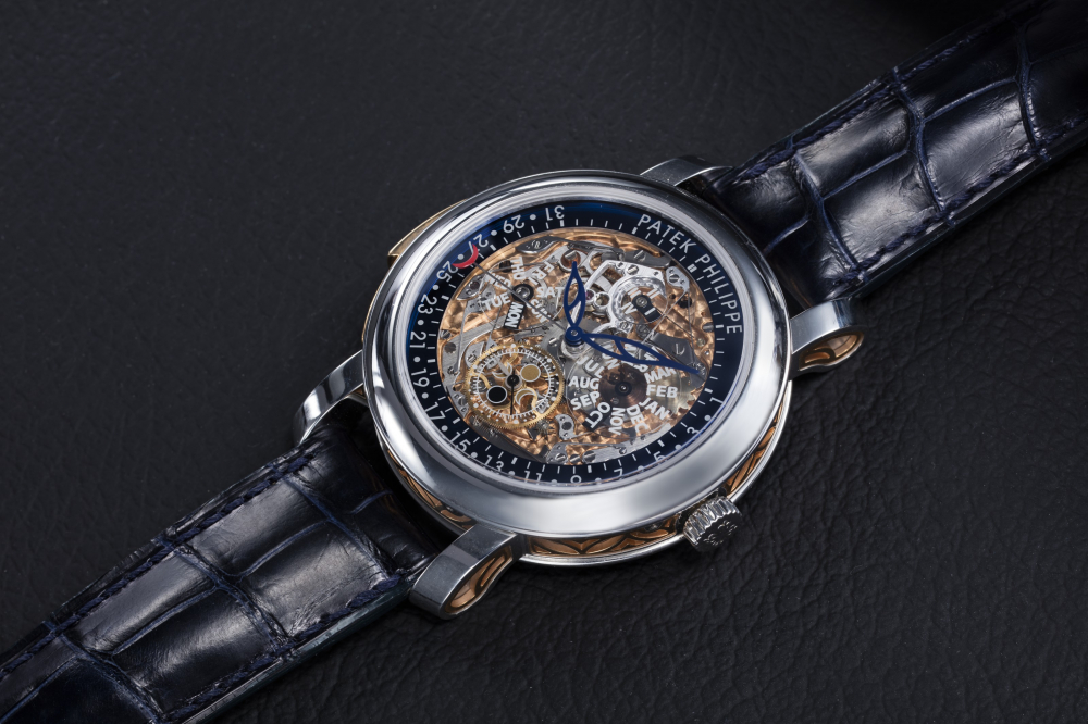 PATEK PHILIPPE, REF. 5104P, A PLATINUM AND GOLD MINUTE REPEATER PERPETUAL CALENDAR - CASE