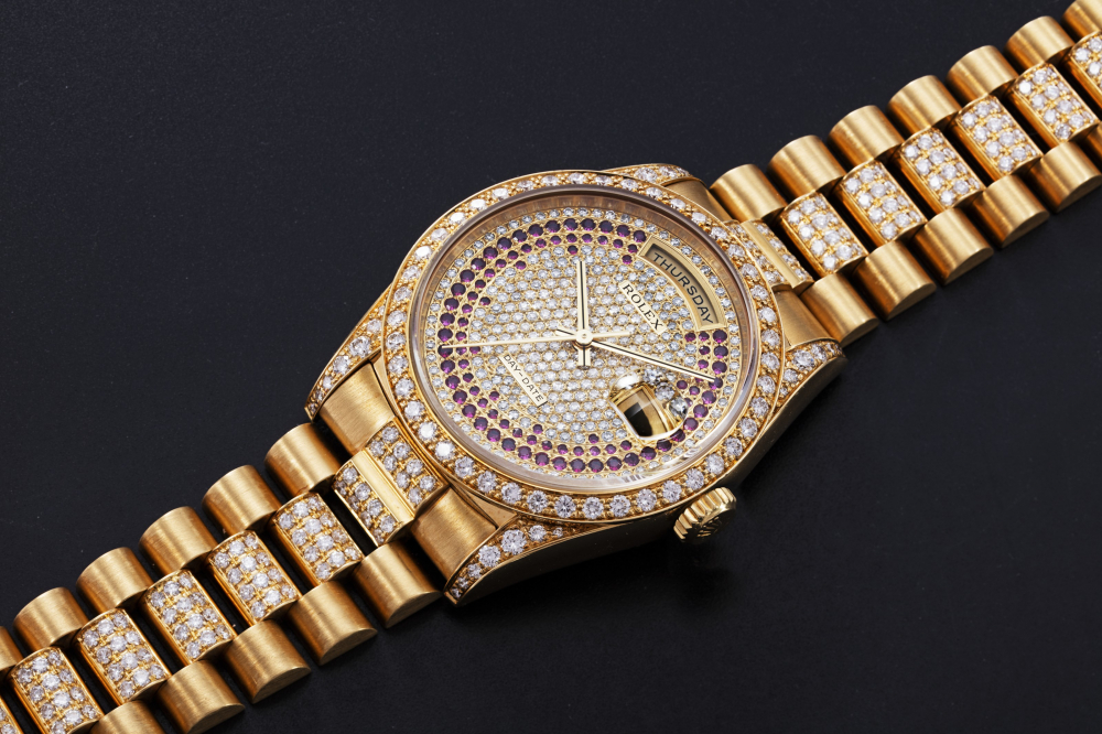 ROLEX, A GOLD OYSTER PERPETUAL DAY-DATE WITH DIAMONDS AND RUBIES, REF. 18388 - CASE