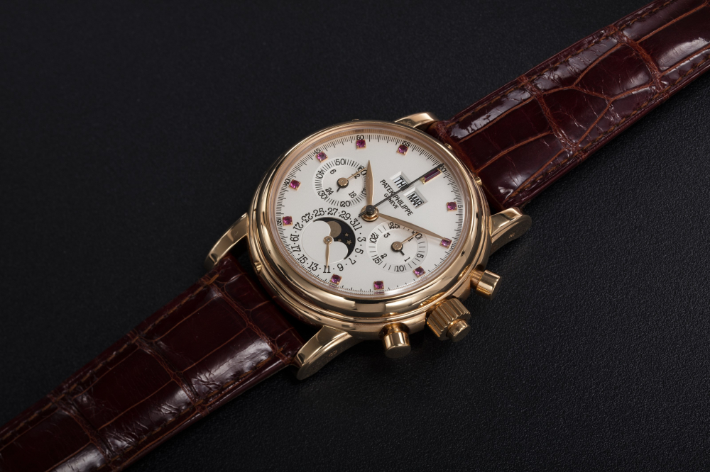 PATEK PHILIPPE, REF. 5004R, A RARE PERPETUAL CALENDAR SPLIT-SECONDS CHRONOGRAPH WITH RUBY HOUR-MARKERS - CASE