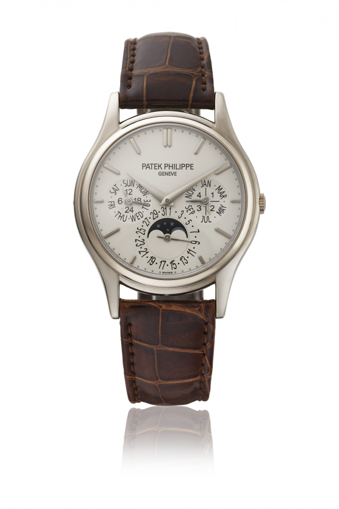 PATEK PHILIPPE. AN 18K WHITE GOLD AUTOMATIC PERPETUAL CALENDAR WRISTWATCH WITH MOON PHASES, 24 HOUR AND LEAP YEAR INDICATION