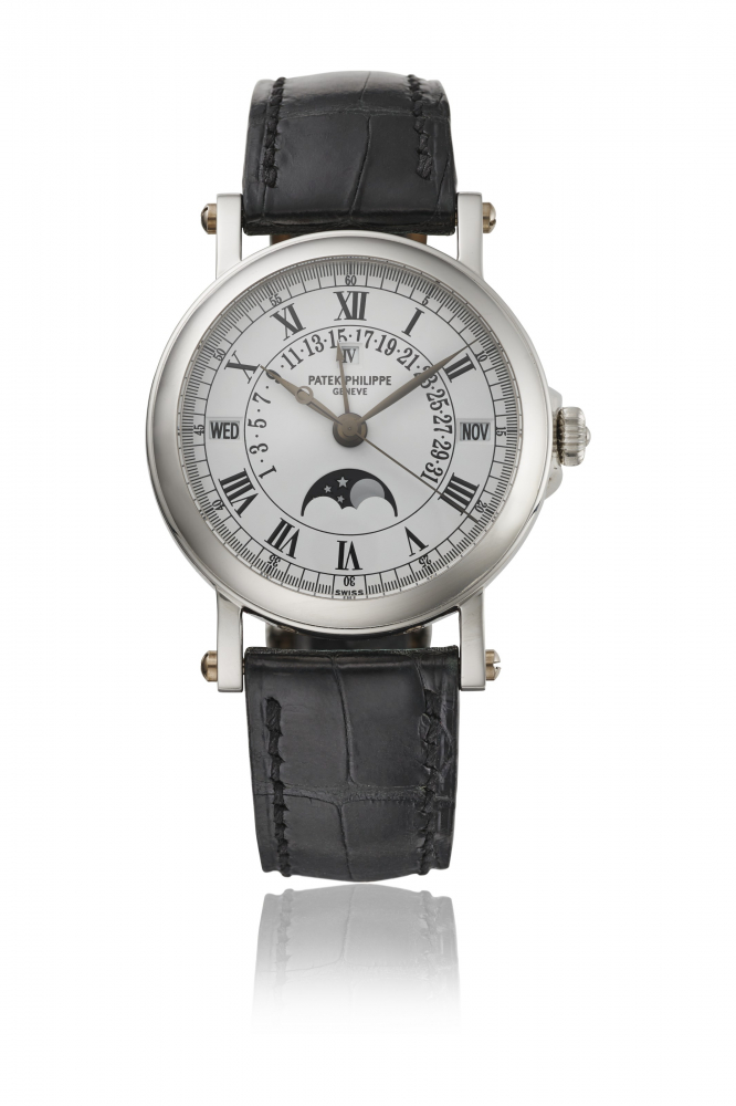 PATEK PHILIPPE. A RARE PLATINUM AUTOMATIC PERPTUAL CALENDAR WRISTWATCH WITH SWEEP CENTRE SECONDS, RETROGRADE DATE, MOON PHASES, LEAP YEAR INDICATION, CERTIFICATE OF ORIGIN AND BOX