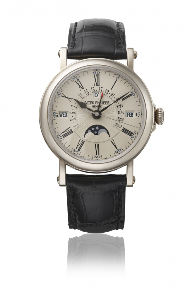 PATEK PHILIPPE. A RARE AND ATTRACTIVE 18K WHITE GOLD AUTOMATIC PERPETUAL CALENDAR WRISTWATCH WITH SWEEP CENTRE SECONDS, RETROGRADE DATE, MOON PHASES, CERTIFICATE OF ORIGIN AND BOX