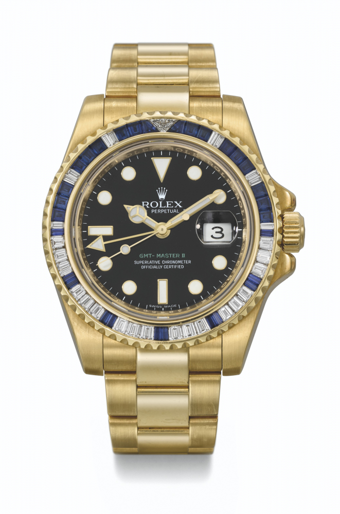 ROLEX. A RARE AND ATTRACTIVE 18K GOLD, DIAMOND AND SAPPHIRE-SET AUTOMATIC DUAL TIME WRISTWATCH WITH SWEEP CENTRE SECONDS, DATE AND BRACELET