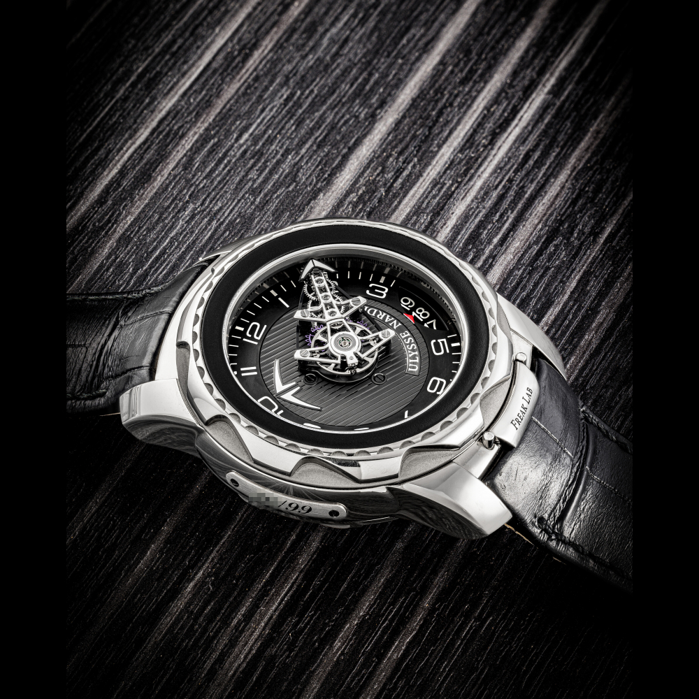 ULYSSE NARDIN. AN UNUSUAL AND RARE 18K WHITE GOLD LIMITED EDITION CARROUSEL TOURBILLON WRISTWATCH WITH DATE