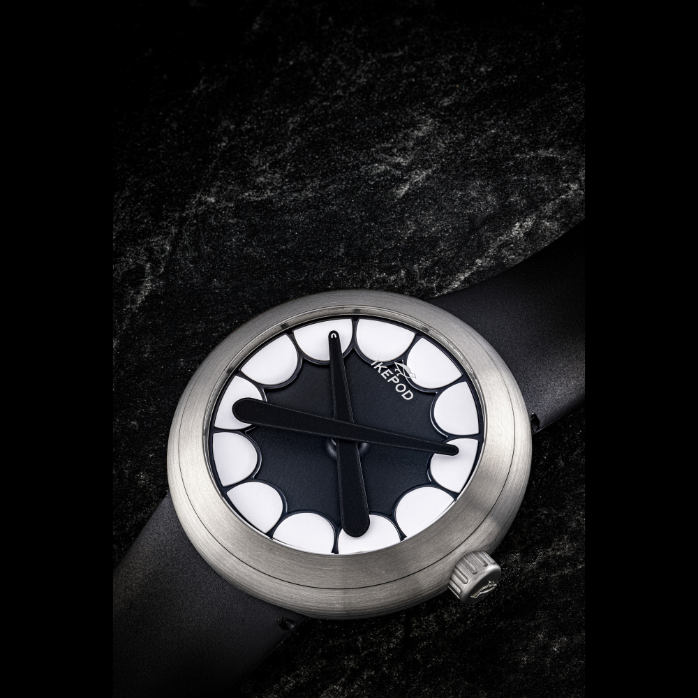 IKEPOD X KAWS. A RARE TITANIUM AUTOMATIC WRISTWATCH