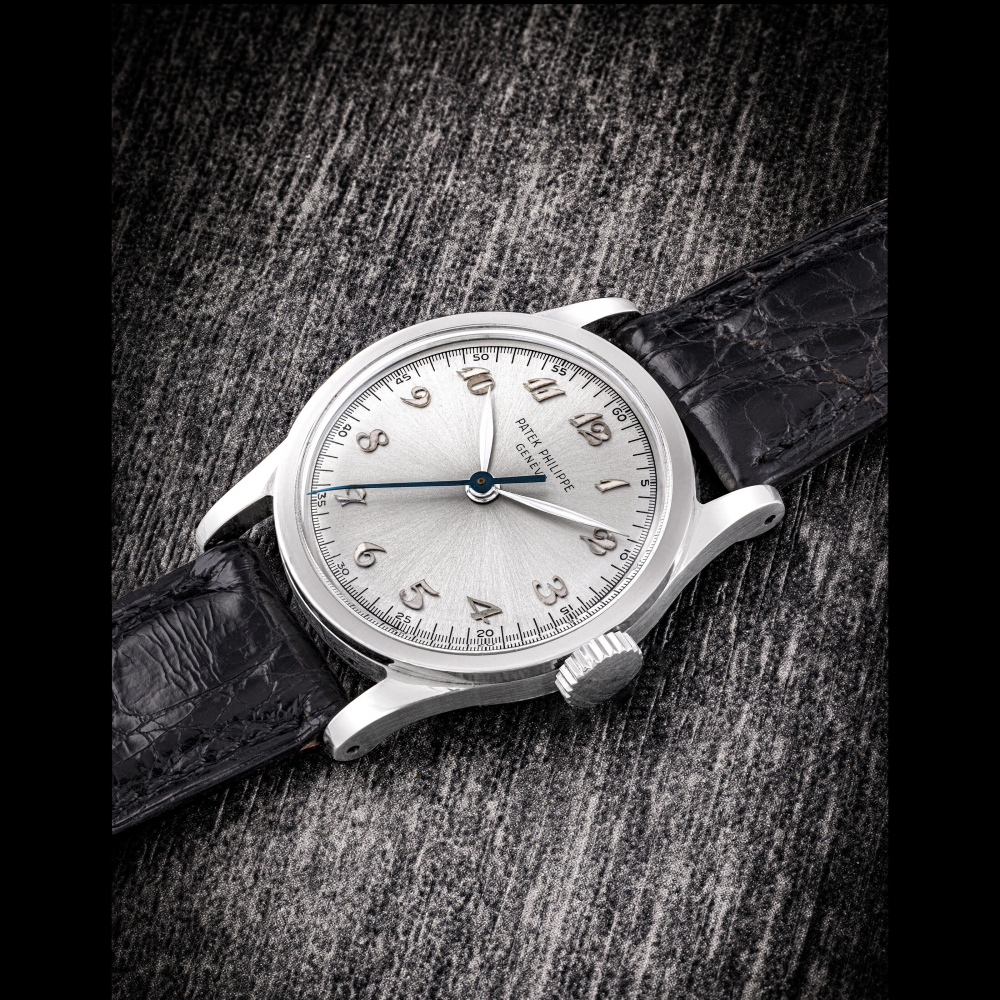 PATEK PHILIPPE. A VERY RARE STAINLESS STEEL WRISTWATCH WITH SWEEP CENTRE SECONDS AND BREGUET NUMERALS