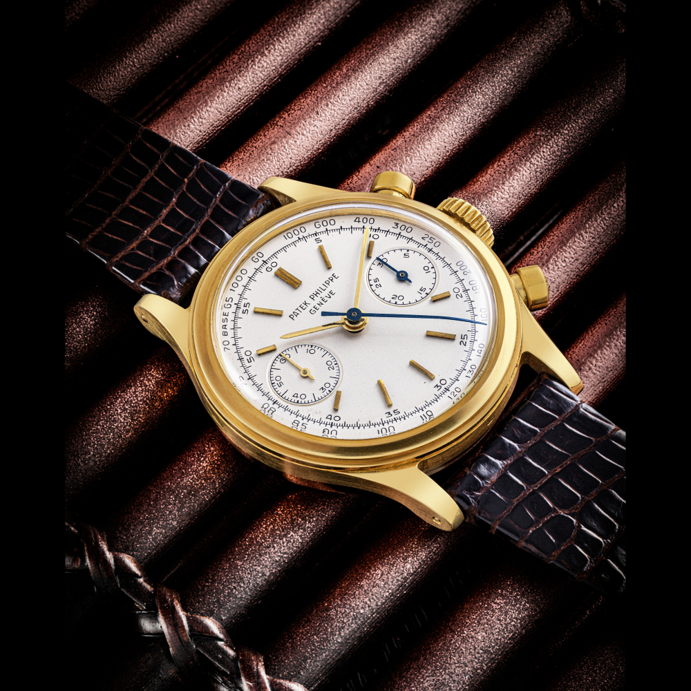 PATEK PHILIPPE. A HIGHLY ATTRACTIVE AND RARE 18K GOLD CHRONOGRAPH WRISTWATCH WITH TACHYMETRE SCALE