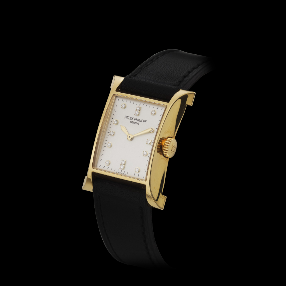 PATEK PHILIPPE, 18K GOLD, LADIES’ PAGODA, 1997 COMMEMORATION, REF. 4900 -