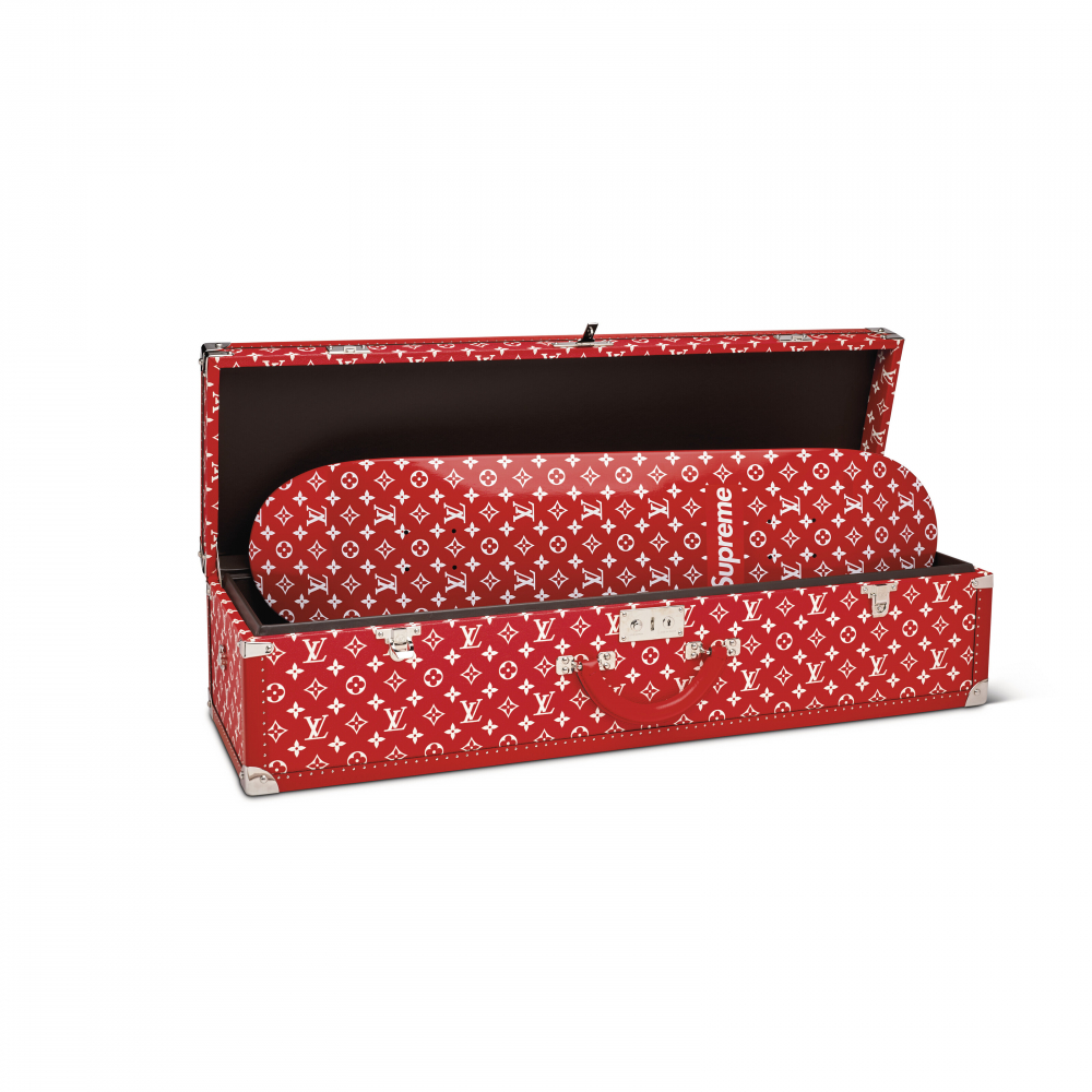 A LIMITED EDITION RED & WHITE MONOGRAM BOÎTE SKATEBOARD TRUNK WITH SILVER HARDWARE BY SUPREME