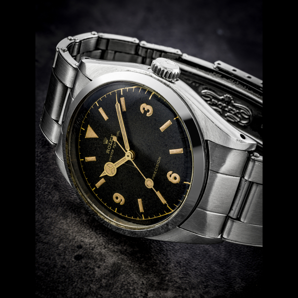 ROLEX. AN EARLY STAINLESS STEEL AUTOMATIC WRISTWATCH WITH SWEEP CENTRE SECONDS AND BRACELET